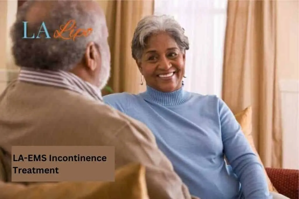 Couple sat smiling at each other - LA-EMS treatment Walham Green
