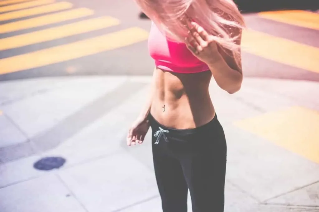 Woman with toned stomach after LA-EMS Body Sculpting Treatment Walham Green